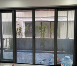 CỬA ĐI LƯỚI XẾP XÍCH
