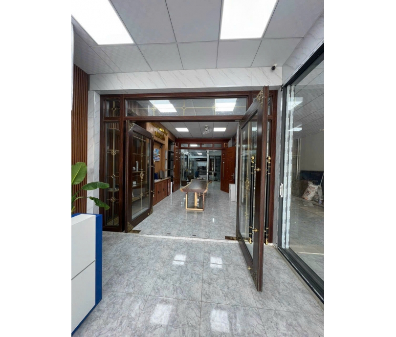 CỬA THỦY LỰC KÍNH HỘP NAN ĐỒNG